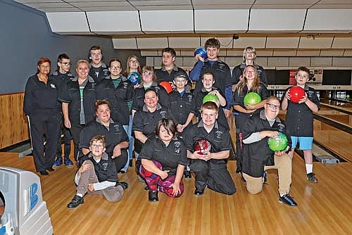 The School District of Rhinelander Special Olympics Bowling team will hold a line dance benefit Sunday, Feb. 1 at Cabaret Cove in Rhinelander. Members of this year’s team posed for a photograph. Pictured, in the front row, from left to right are, Damon Strobel,  Ona Godfrey, Spencer Smith and Brayden Kuhn. In the second row are Krystal Barlowski, Allison Brunette, Nina Hazelton, Gannon LaCrosse, Miah Fath, Kyleigh Hartzke and Henry Lehman. In the back row are Marcy Shetler, Hudson LaCrosse, Tiffany LaCrosse, Matthew Fessenden, Carmen Fessenden, Abby Adams, Jameson Flynn, James King, Drake Winters. (Photo by Bob Mainhardt for the River News)