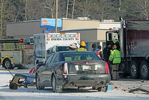 Emergency personnel at the scene of a fatal two-vehicle collision on U.S. Highway 51 in Arbor Vitae on Tuesday, Jan. 27. (Photo by Trevor Greene/Lakeland Times