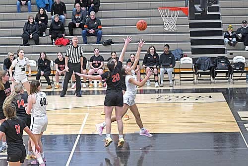 Malia Newport attempts a shot against the defense of Marshfield’s Lily Adler in the first half of a non-conference game Tuesday, Feb. 3 at Ted Voigt Court in Minocqua. (Photo by Brett LaBore/Lakeland Times)