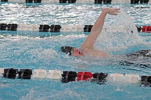 Garrison Jacques does the 100 backstroke during the Great Northern Conference meet Friday, Feb. 6 at the Lakeland Union High School pool in Minocqua. (Photo by Brett LaBore/Lakeland Times)