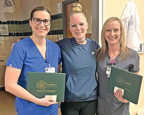 Aspirus Rhinelander Hospital recently honored Rachel Milkey, RN, left, and Kristine Morgan, RN, right, with the DAISY Award for Extraordinary Nurses in recognition of their commitment and patient-centered approach to care. The award is part of the DAISY Foundation’s program to recognize the super-human efforts nurses perform every day. Danielle Zietlow, center, is the patient who nominated them. (Contributed photograph)
