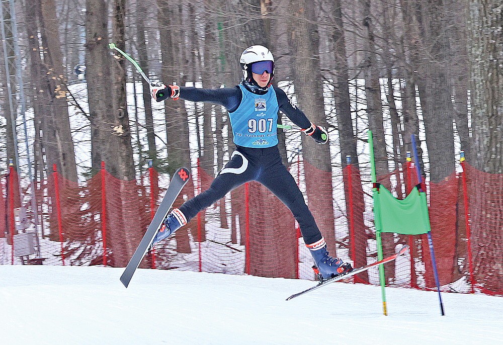 Rhinelander’s Ben Olson catches air on a jump near the finish of the Super G run during a WIARA Northern Conference race at Granite Peak in Wausau Thursday, Feb. 5. Olson finished second on the day and the Hodag boys were second in the team standings. (Bob Mainhardt for the River News)