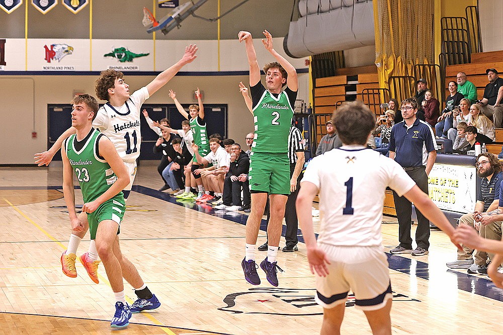 Rhinelander’s Devon Feck attempts a 3 during the first half of a GNC boys’ basketball game at Tomahawk Tuesday, Feb. 10. Feck made the shot, scoring his 1,000th career point in the process, as the Hodags went on to defeat the Hatchets, 77-35. (Bob Mainhardt for the River News)