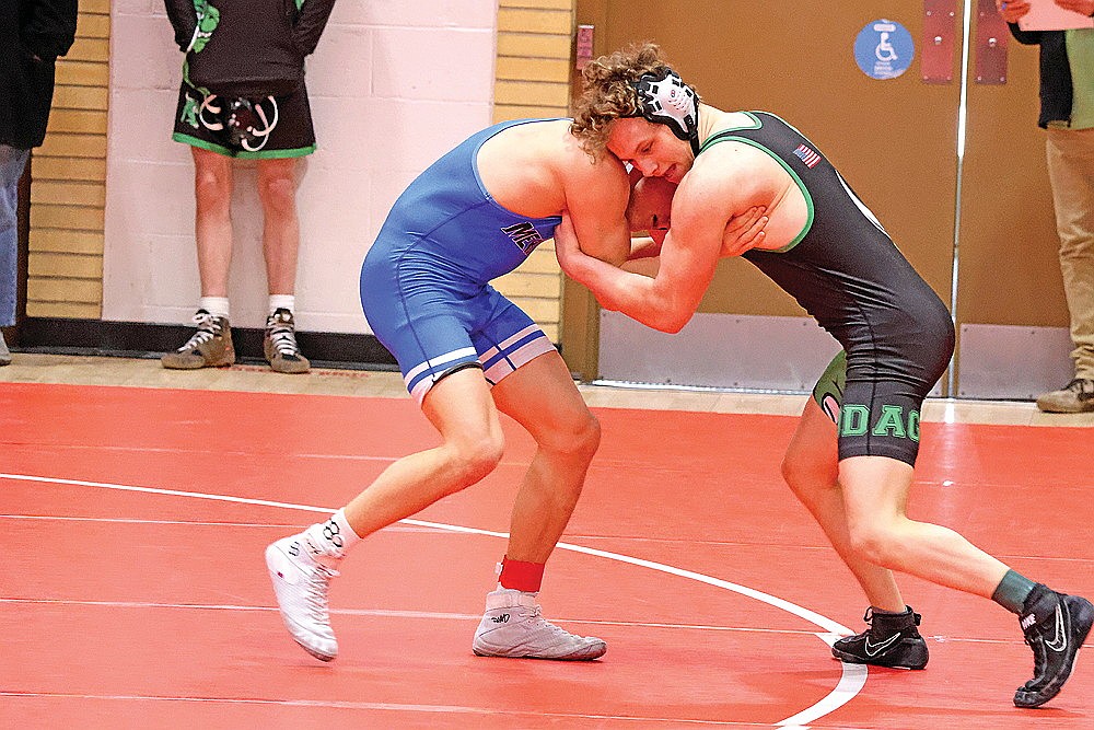 Rhinelander’s Anthony Boldt, right, grapples with Merrill’s Remington Skic during the GNC boys’ wrestling tournament in Medford Saturday, Feb. 7. Boldt finished third in the 150-pound weight class.