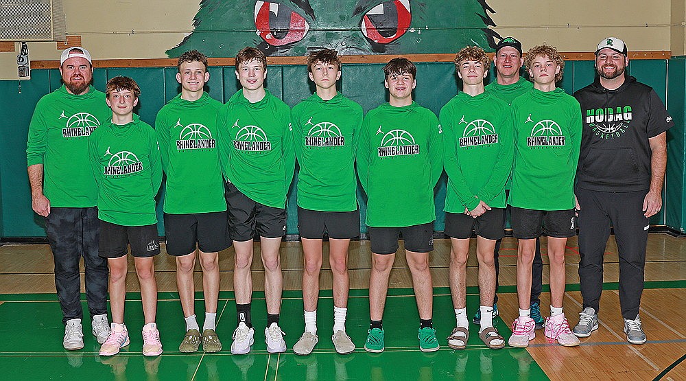 The RBA eighth-grade black team poses for a photograph after winning its home tournament Saturday, Feb. 14 at James Williams Middle School. Pictured, from left to right, are coach Jason Kremer, Coltyn Anderson, Hans Sommer, Jaxson Kremer, Max Howard, Carter Bell, Connor Clark, coach Ted Sommer, Nolan Pasanen and coach Josh Clark. (Bob Mainhardt for the River News)