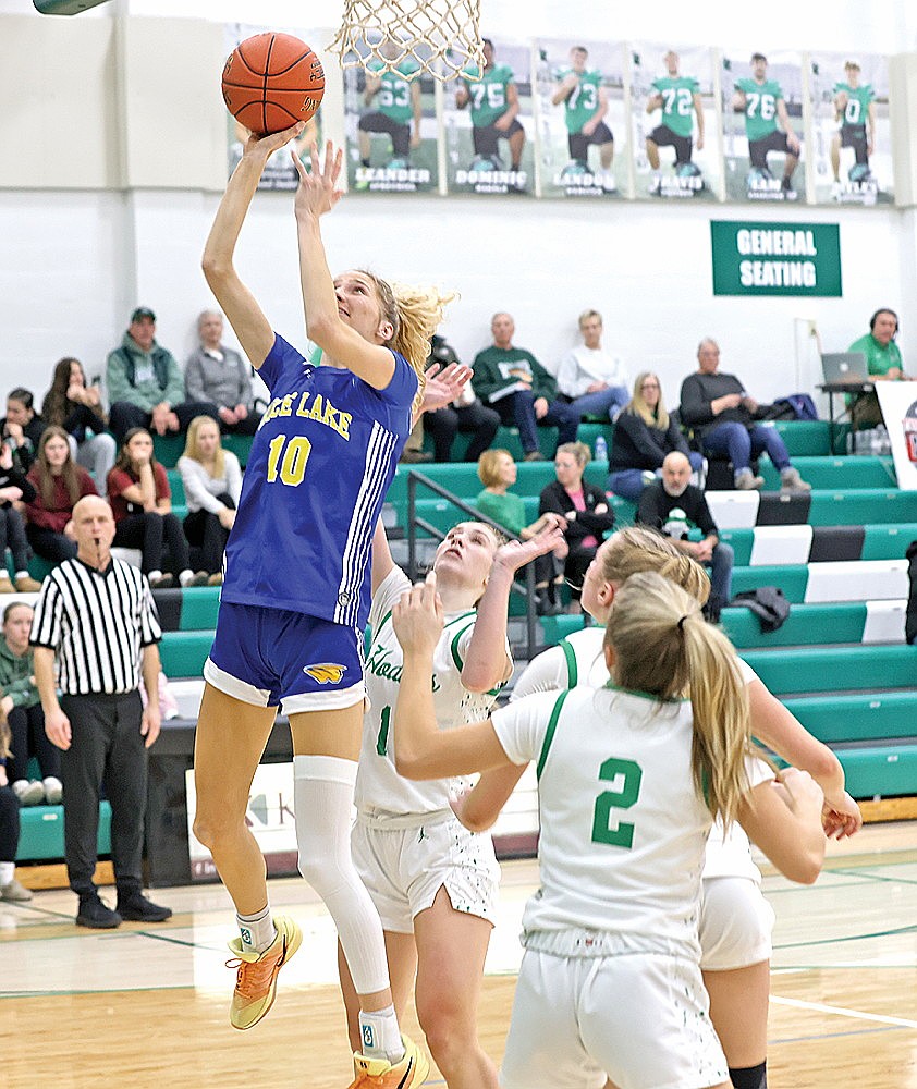 Rice Lake’s Adaline Sheplee goes up for a layup during the second half of a non-conference girls’ basketball game against Rhinelander at the Jim Miazga Community Gymnasium Tuesday, Feb. 17. Sheplee, who has committed to the University of Wisconsin, scored her 2,000th career point on the play and finished with a game-high 28 points in the Warriors’ 72-32 win over the Hodags. (Bob Mainhardt for the River News)