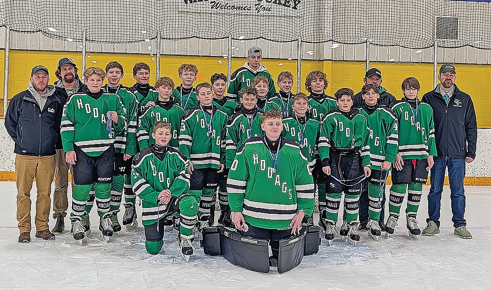 The Rhinelander Ice Association’s Bantam (U14) hockey team took sixth at the WAHA Class 3A state bantam hockey tournament in Waupun Feb. 21-22. The team posed for a photograph after its final game. Pictured in the front row, from left to right, are Jacob Beran and Owen Wallermann. In the second row are Collin Jorata, Alec Pilat, Huey Anunson, Maxwell Cahee, Max Miljevich and Sawyer Peters. In the back row are coach Jon Bessa, coach Ryan Gartmann, Wyatt Peters, Will McCone, Evan Rodziczak, Jacob Baumann, Gage Chavez, Nick Schneider, Emmerich Crass, Ben Gerhmann, Nash Swartz, Coach Tyler Pyrchalla, Mac McCloskey and head coach Jed Peters. (Contributed photo)