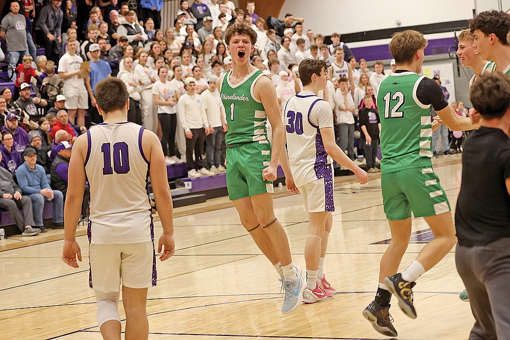 Rhinelander’s Jatyn Barkus celebrates after Rhinelander defeated Mosinee 75-73 in double overtime in a GNC boys’ basketball game in Mosinee Thursday, Feb. 26. Rhinelander shared the conference title with Mosinee as a result, securing a third consecutive GNC title for the Hodags. (Bob Mainhardt for the River News)
