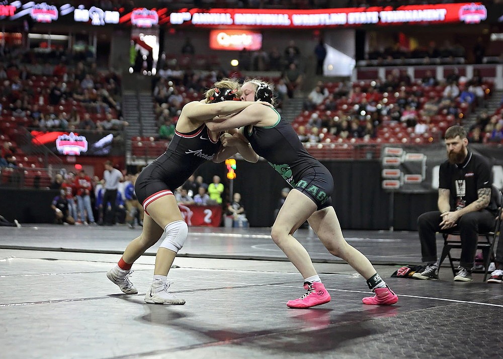 Rhinelander's Cassidy Lindner battles Arcadia's Kalyce Sobotta during the WIAA girls' individual state wrestling tournament in Madison Friday, Feb. 27. (Contributed photograph)