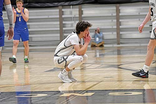 Benny Gahler takes in the final moments following Lakeland’s 61-60 loss in overtime to Rice Lake in a WIAA Division 2 regional quarterfinal game Tuesday, March 3 at Ted Voigt Court in Minocqua. (Photo by Brett LaBore/Lakeland Times)