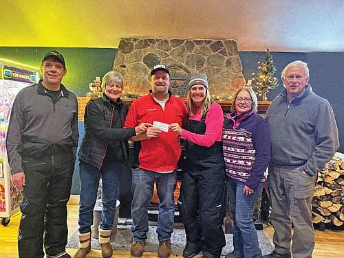 Those attending the check presentation are, from left, Mike Nelson, Gail Ondresky, Matt Cleveland, Brenda Nelson, Vicki Marshall and Jeff Marshall. (Contributed photograph)
