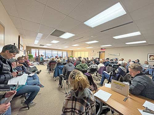 Residents of Minocqua and surrounding communities packed the room during a Minocqua town board meeting where a potential bike/pedestrian trail along State Highway 70 on the town’s west side was being discussed Tuesday, March 3. (Photo by Trevor Greene/Lakeland Times)