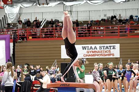 Malin Awker competes her second vault during the WIAA Division 2 individual state gymnastics competition Saturday, March 7 at Lincoln High School in Wisconsin Rapids. Awker finished 23rd with a score of 8.3. (Photo by Brett LaBore/Lakeland Times)