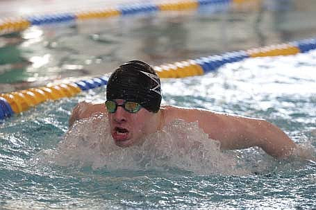 In this Feb. 14, 2026 file photo, Garrison Jacques does the 100 butterfly during a WIAA Division 2 sectional meet at the Rice Lake Natatorium. (Photo by Jeremy Mayo/River News)