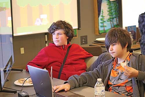 In this Feb. 25, 2025 file photo, Xander Pomroy, left, and Samuel Waalkens, right, test out the game they created at the 2025 Global Game Jam Showcase Night at Nicolet College in Rhinelander. This year’s event will be held Wednesday, March 11. (File photo)