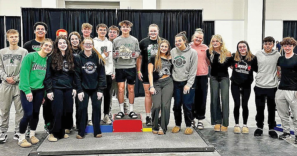 Members of the Rhinelander High School club powerlifting team pose with their runner-up plaque from the WHSPA state meet Sunday, March 8 in Appleton. Pictured in the front row, from left to right, are Gretchen Fiebke, Claire Ourada , Taylor McKinney, Brooklyn Marten, Taylor Dahlquist and Saige Mutter. In the back row are Michael Brunette, Dom Hakala, Jacob Guinther, Jackson Waydick, Trevor Denton, Landon Webster, Trenton Smits, Libbey Buchmann, Sadie Edyvean, Shyanne Hueckstaedt, Payten Denton, Canyon Sizemore and Grady DeBay. State qualifiers Myles Eagleson, Kali Skubal, Carlie Pudlowski, Isaac Rossing and Madalyn Soulier were unavailable for the photograph. (Contributed photo)