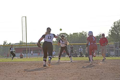 In this June 4, 2025 file photo, Rayna Hella throws to Malia Newport to record an out in a WIAA Division 2 sectional semifinal game against Medford at Raider Field in Medford. Hella and Newport give Lakeland experience and versatility. (Photo by Brett LaBore/Lakeland Times)