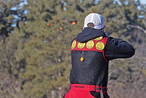 Jackson Siegel shatters a clay during the first conference shoot on March 23 in Minocqua. (Photo by Blake Richard/River News)