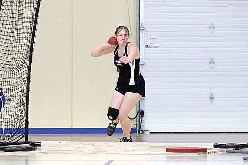 Hannah Fieweger goes through her shot put motion during the Northland Pines Indoor Invite Thursday, March 26 at Northland Pines High School in Eagle River. Fieweger took first with a throw of 31-6 1/2. (Photo by Jeremy Mayo/River News)