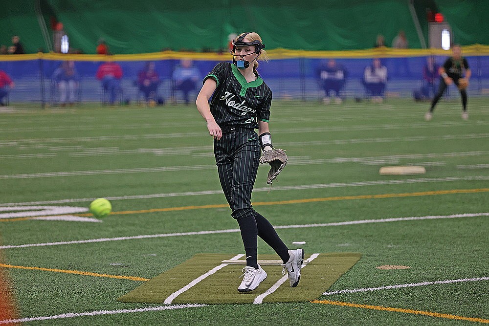 Rhinelander’s Aleece Johnson pitches during a non-conference softball game against Crandon in the Hodag Dome Thursday, March 26. Johnson struck out 12 batters over seven innings as the Hodags defeated the Cardinals, 7-3. (Bob Mainhardt for the River News)