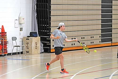 Main Byram practices his hitting during the first day of the season Monday, March 30 at the Lakeland Union High School fieldhouse in Minocqua. (Photo by Brett LaBore/Lakeland Times)