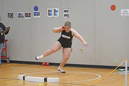 Brooklynn Kussard goes through her shot put motion during the T-Bird Indoor Invite Saturday, March 28 at Lakeland Union High School in Minocqua. (Photo by Brett LaBore/Lakeland Times)