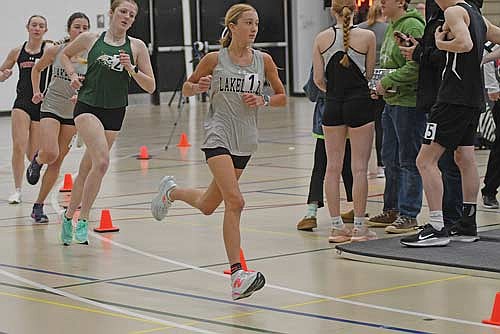 Emerson Rubo runs the 1,600 during the T-Bird Indoor Invite Saturday, March 28 at the Lakeland Union High School fieldhouse in Minocqua. Rubo took first with a time of 5:45.97. (Photo by Brett LaBore/Lakeland Times)