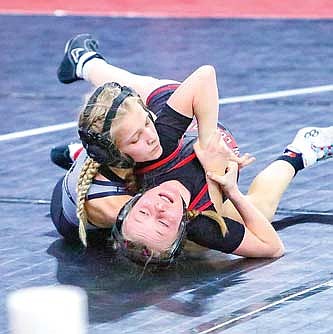 Kennedy Howard, top, wrestles New London’s Alaina Zeinert during the Wisconsin Wrestling Federation (WWF) Kids Folkstyle State Championships Sunday, March 29 at Alliant Energy Center in Madison. Howard won her second state championship in three years. (Contributed photograph)