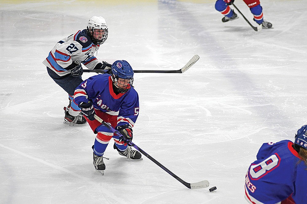 In this Feb. 28, 2026 file photo, Reese Retallick goes up the ice in the second period of a WIAA sectional final against Superior at the Hayward Sports Center. (Brett LaBore/Lakeland Times)
