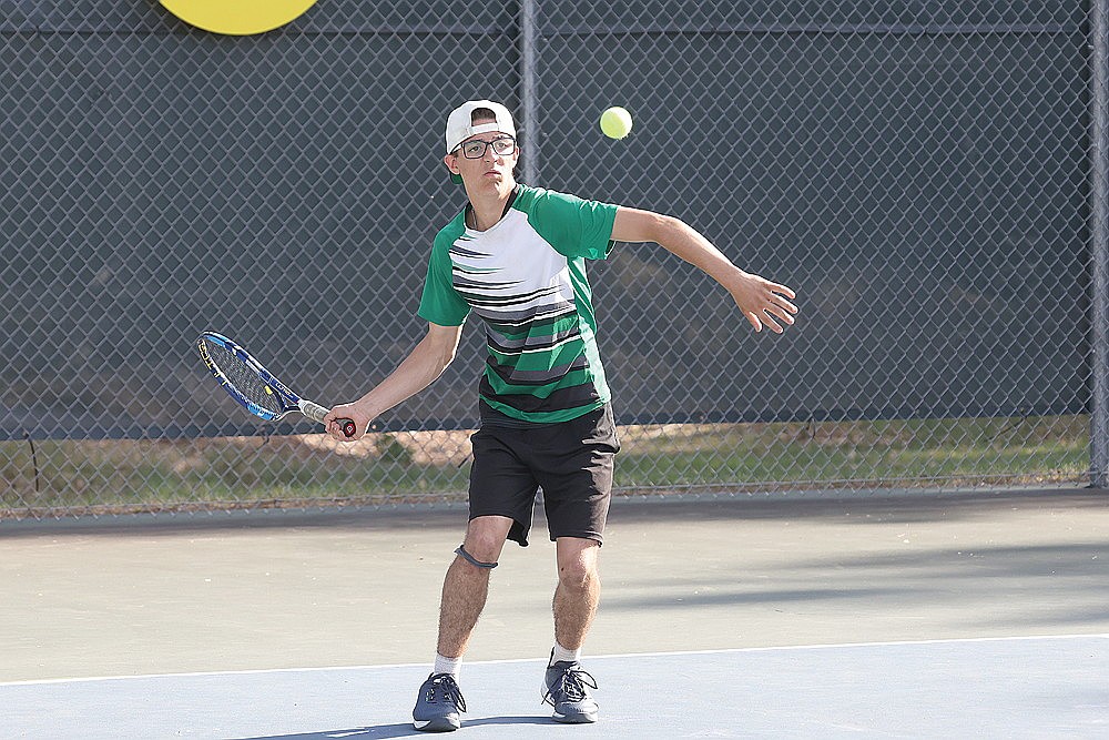 In this May 13, 2025 file photo, Asher Rivord plays a point against Medford’s Ethan Kollmensburger during a GNC boys’ tennis dual meet at the RHS tennis courts. Rivord, a junior, went 15-7 overall last year as was the GNC champion at No. 3 singles. (Bob Mainhardt for the River News)