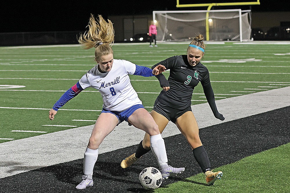 Rhinelander’s Mollie Arneson (3) battles Merrill’s Hailey Cole (8) for possession during the second half of a GNC girls’ soccer game at Mike Webster Stadium Tuesday, April 7. The Hodags defeated the Bluejays, 6-0. (Bob Mainhardt for the River News)
