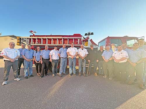 Those present to celebrate Rick Fuhrman’s 50 years serving on the Hazelhurst Fire Department, from left, are: Scott Pockat, Dan Noll, Paul Bender, Erin Schoepke, Howard Honig, Justin Schlecht, Russ Schoepke, Nathan Meade, Fuhrman, Ted Cushing, Jeff Verdoorn, Chuck Benbenek, Pat Winger, Luke Steffes, Paul Zemke, Wesley Taylor and Michael Hammon. Not pictured: Paul Fuhrman, Matt Strasburg, Dan Welch and Brad Strasburg. (Photo by Trevor Greene/Lakeland Times)