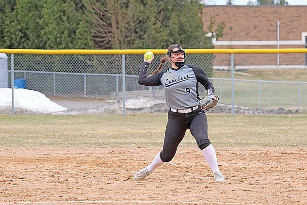 Marlee Strasburg gears up for a throw in the fourth inning of a conference game against Medford Thursday, April 9 at Raider Field in Medford. (Photo by Matt Frey/Star News)