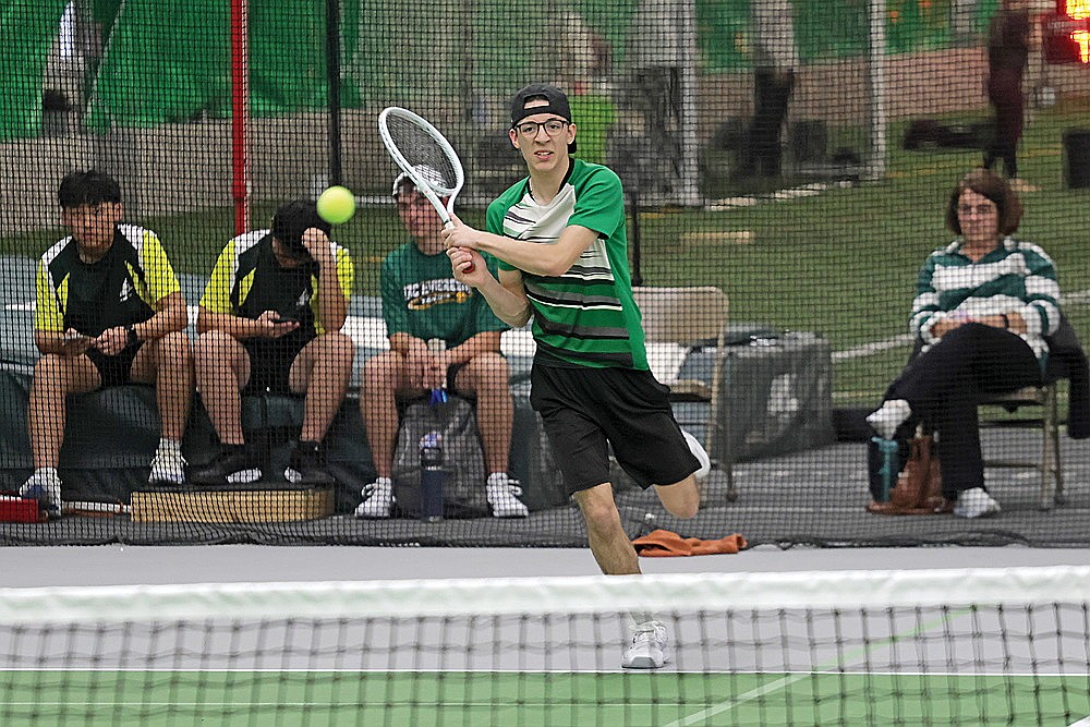 Rhinelander’s Asher Rivord hits a return during a non-conference boys’ tennis match against D.C. Everest in the Hodag Dome Thursday, April 9. Rivord defeated Everest’s Tim Waller in a match tiebreaker at No. 1 singles, part of a 6-1 victory for the Hodags. (Jeremy Mayo/River News)