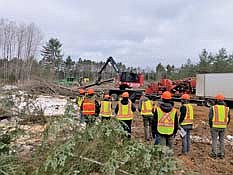 UW-Madison forestry students got to see an active logging job on the Northern Highland American Legion State Forest. Father and son professional loggers, Mike and Brian Fink, demonstrated their whole-tree chipping operation and communcated practical realities of logging that every aspiring forester must learn. (Contributed photograph)