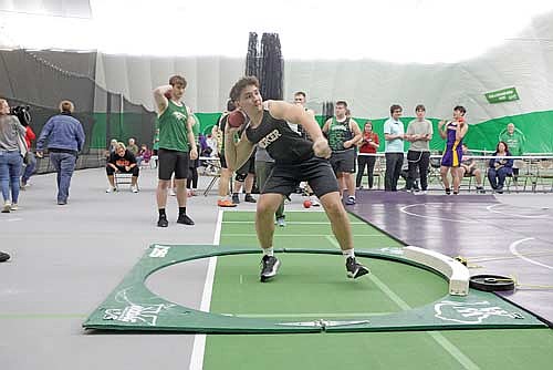 Rex Brandenburg gets ready to toss the shot put during the Hodag Hybrid Indoor/Outdoor Invite Tuesday, April 14 at the Hodag Dome in Rhinelander. (Photo by Jeremy Mayo/River News)