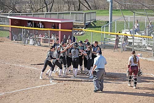 Malia Newport swings for contact in a conference game against Antigo Thursday, April 16 at Al Remington Ball Field in Antigo. (Antigo Sports Photography)