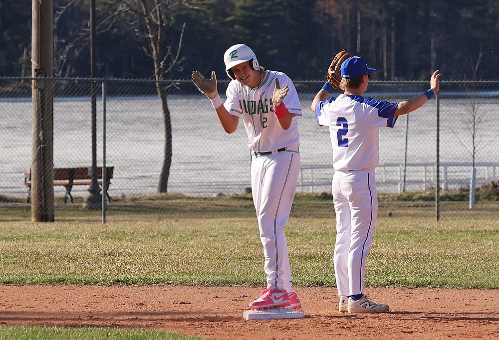 Rhinelander’s Abe Gretzinger claps after hitting a double during the first inning of a GNC baseball game against Merrill at Stafford Field Thursday, April 16. Rhinelander improved to 3-0 on the year with an 11-1 win over the Bluejays. (Bob Mainhardt for the River News)