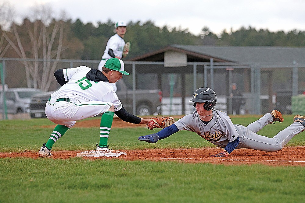 Hodag first baseman, Sawyer Bishop (15), looks to tag Wally Horabick of Tomahawk on a pick-off move from pitcher Conner Rappley in the fourth inning of a conference contest at Stafford Field April 30. Rappley struck out 10 in a no-hitter and picked off Horabick to clear the bases. (Blake Richard/River News)
