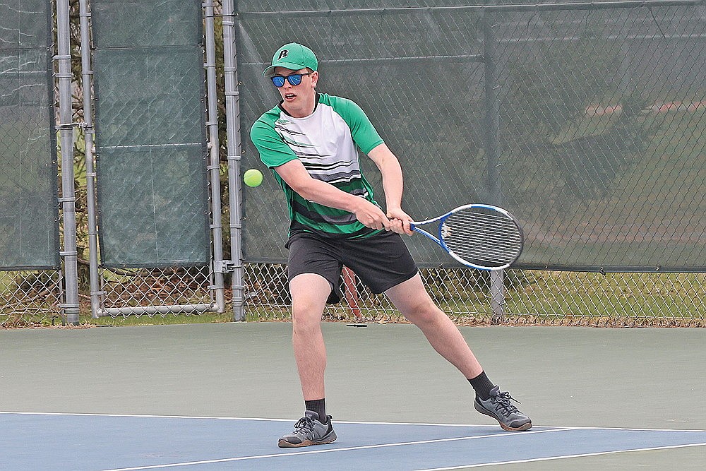 Rhinelander’s Kellen O’Malley plays a point during a non-conference boys’ tennis match against Stevens Point at the RHS tennis courts Tuesday, May 5. (Bob Mainhardt for the River News)
