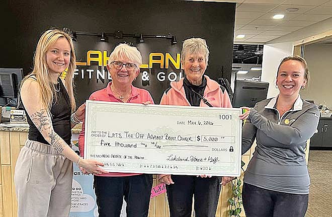 Those attending the check presentation include Sarah Knowles, employee; Karen Lewis, chairman of “Let’s Tee Off Against Breast Cancer”; Becky Rathkamp, committee member; and Ashley Weis, manager of Lakeland Fitness and Golf. (Contributed photograph)