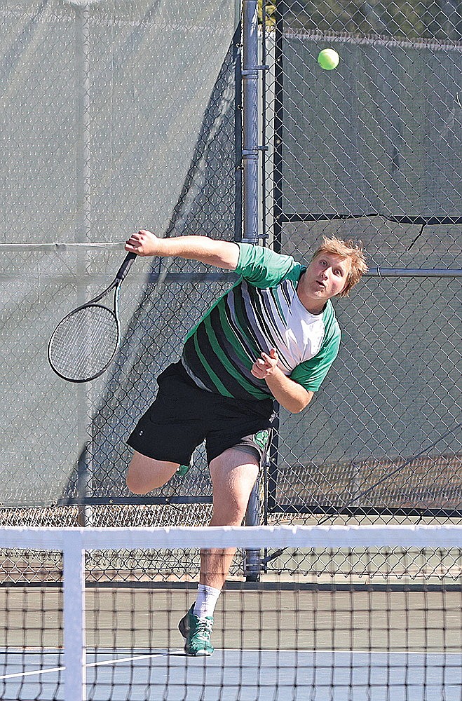 Rhinelander’s Danek Koniar serves during a GNC boys’ tennis match against Pacelli at the RHS tennis courts Monday, May 11. Koniar and No. 1 doubles partner Henry Bonardelli won their match in straight sets. (Bob Mainhardt for the River News)