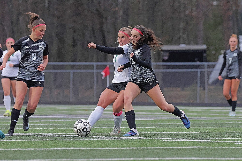 Rhinelander’s Ella Miljevich is shouldered off the ball by Lakeland’s Addie Hagen (3) during the first half of a GNC girls’ soccer game in Minocqua Tuesday, May 12. The Hodags lost to the T-Birds, 2-0, falling two games behind Lakeland in the GNC race with three games remaining. (Jeremy Mayo/River News)