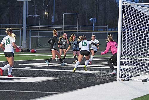 Malin Awker (5) connects on a goal in the second half of a 2-0 win over Rhinelander Tuesday, May 12 at IncredibleBank Field in Minocqua. The Thunderbirds hold a six-point lead over second-place Rhinelander in the conference standings. (Photo by Brett LaBore/Lakeland Times)