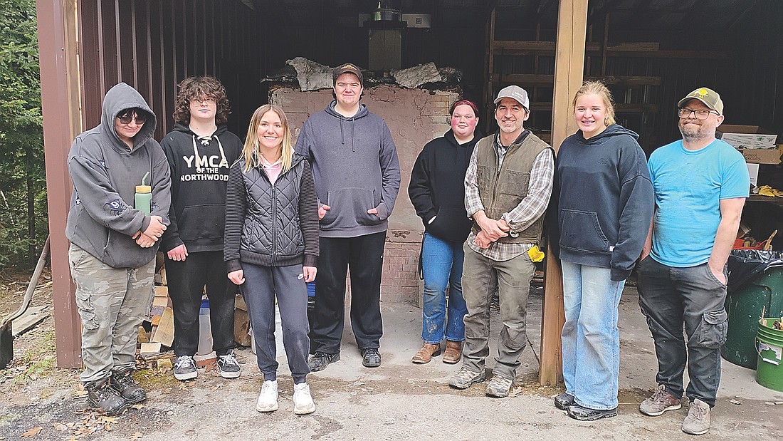 RHS students experienced the traditional wood-fired ceramics process at Nicolet College last month, creating works displayed today, May 15, in downtown Rhinelander. Pictured, from left, Ace Towne, Caleb Luce, Claire Yunkers, Eric Berger, Crystal McLeod, RHS instructor Josh Calhoun, Emma Houg and Nicolet College instructor Nate Wilson. (Contributed photograph)