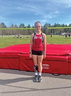 Jayden Cella stands next to the high jump after setting a new school record of five feet during a middle school track meet Thursday, May 14 at Arbor Vitae-Woodruff Elementary School in Arbor Vitae. (Contributed photograph)