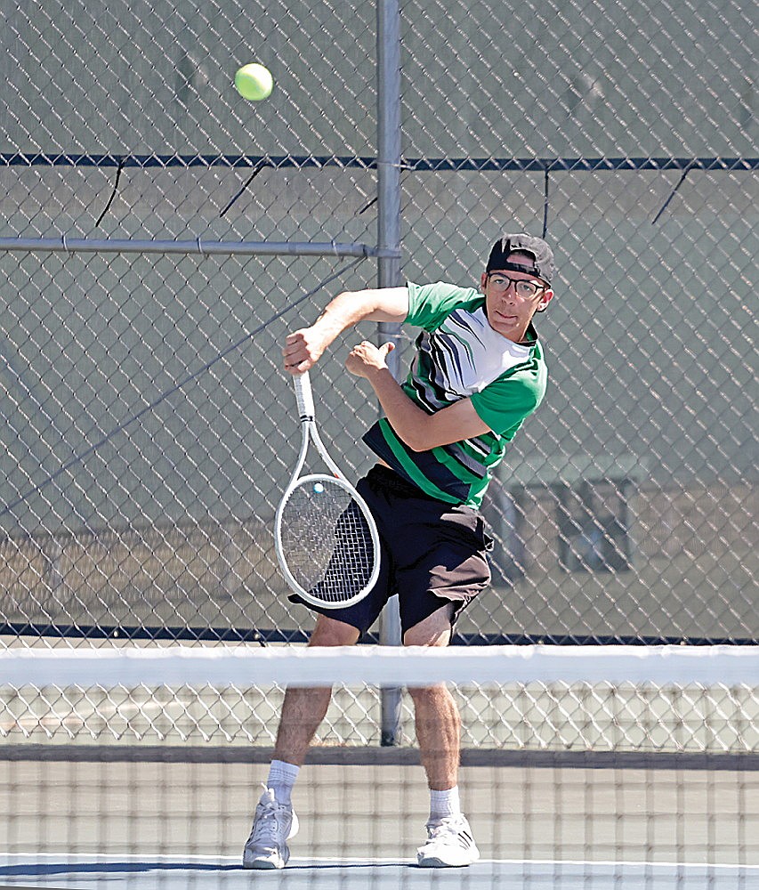 Rhinelander’s Asher Rivord serves during a match in the Northwoods Classic tennis invite at the RHS tennis courts Friday, May 15. Rivord picked up three wins in his matches over the weekend as the Hodags went 2-3 in their five contested duals. (Jeremy Mayo/River News)