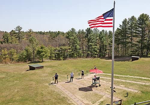 Northwoods Invitational shooters compete in trap singles at the Minocqua Gun Club on May 15. Competitors at the invite could shoot in multiple disciplines including trap singles, trap doubles, skeet, and sporting clays. (Photo by Blake Richard/River News)