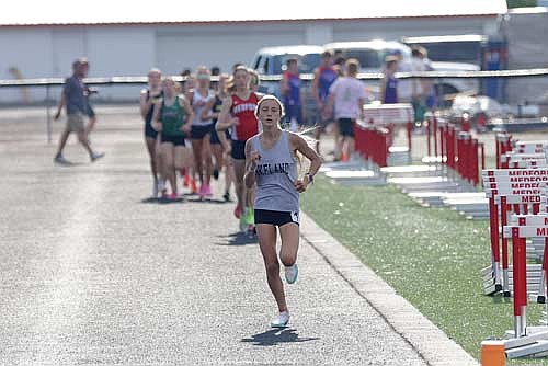 Emerson Rubo leads a pack of runners in the 1,600-meter run during a WIAA Division 2 regional meet Tuesday, May 26 at Raider Field in Medford. Rubo won regional titles in the 1,600- and 3,200-meter runs. (Photo by Jeremy Mayo/River News)