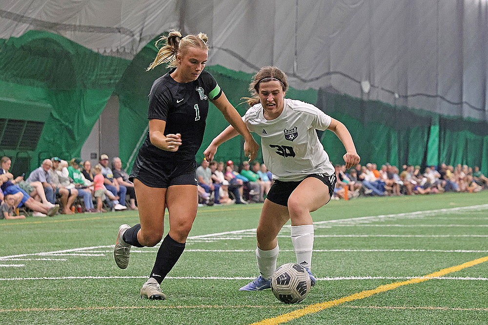 Rhinelander’s Ella Miljevich battles for an attempted shot during a game against Mosinee Tuesday, May 26 in the Hodag Dome. Miljevich was among the GNC leaders in goals and assists at the conclusion of the regular season. (Blake Richard/River News)